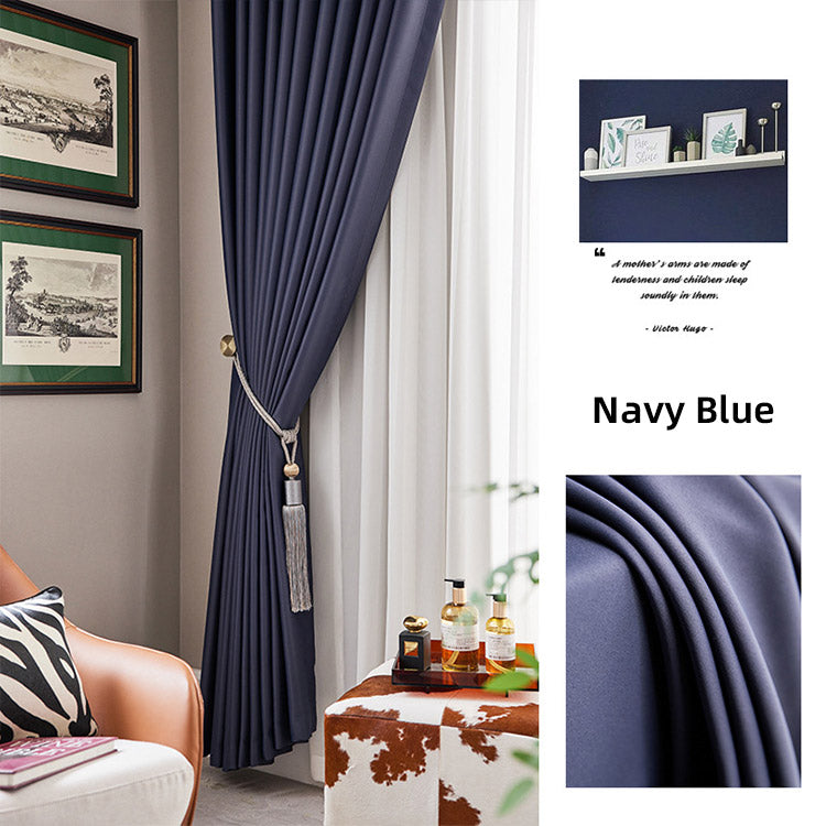 Navy blue blackout curtains in a modern interior