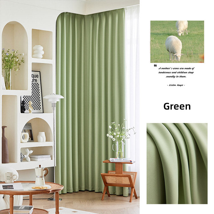 Sage green blackout curtains in a modern living room