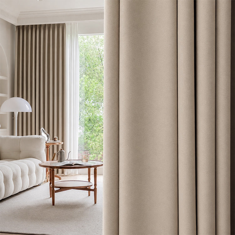 Beige cotton linen light filtering curtains in a minimalist living room