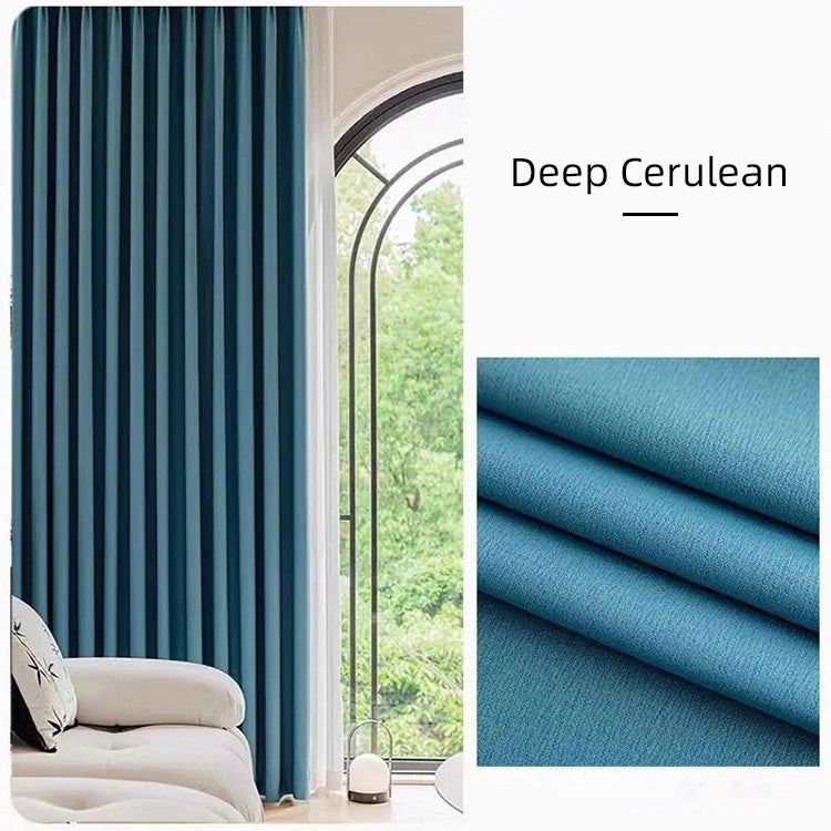 Deep cerulean blue cotton linen curtains in a bright living room