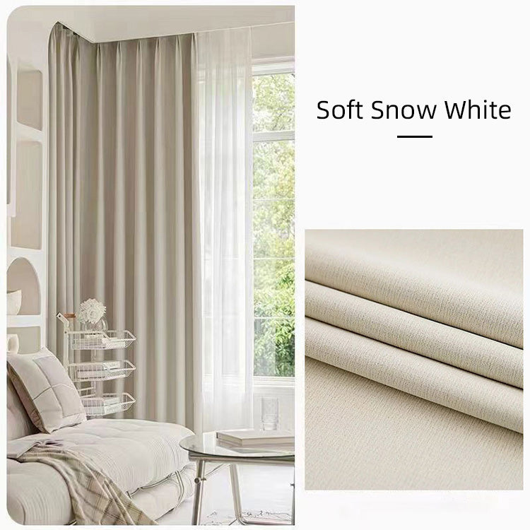 Soft snow white cotton linen curtains in a bright airy room