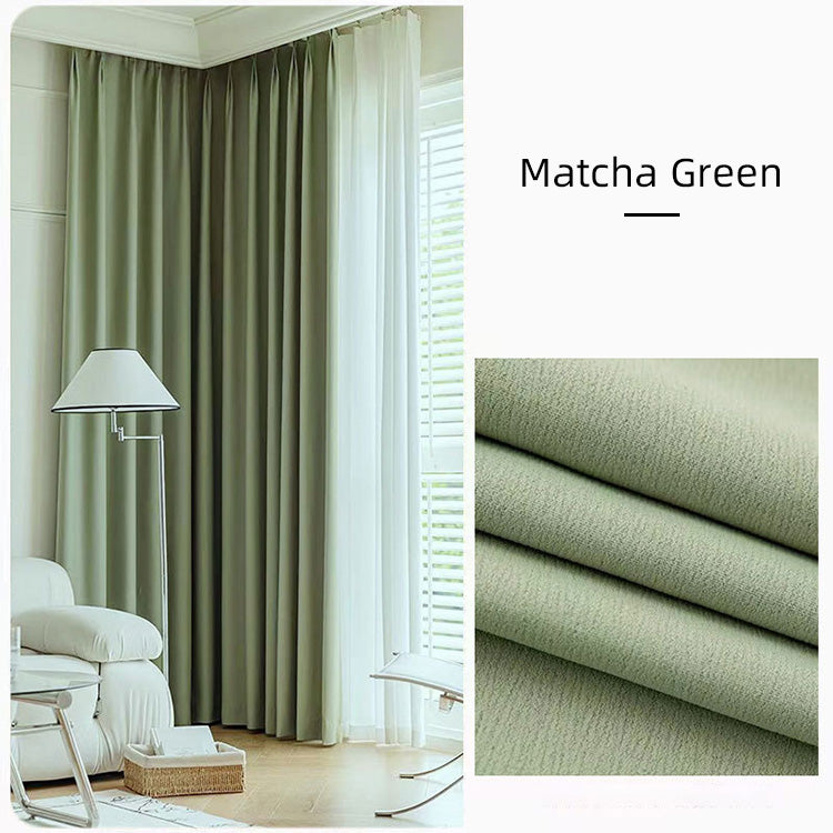 Matcha green cotton linen curtains in a bright modern room
